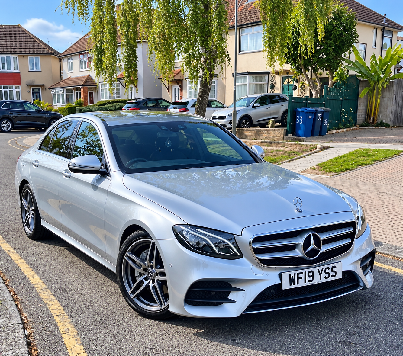 Silver Mercedes on a Sunny Suburban Street